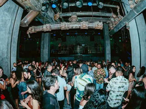 Packed dance floor with hands in the air under the lights at The Catwalk Club, Downtown LA (Sat 25 June)