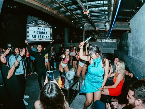 Packed dance floor with hands in the air under the lights at The Catwalk Club, Downtown LA (Sat 25 June)