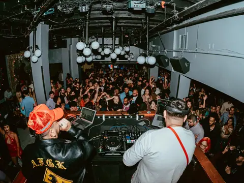 Packed dance floor with hands in the air under the lights at The Catwalk Club, Downtown LA (Sat 25 June)