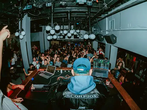 Packed dance floor with hands in the air under the lights at The Catwalk Club, Downtown LA (Sat 25 June)