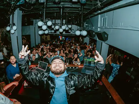 Packed dance floor with hands in the air under the lights at The Catwalk Club, Downtown LA (Sat 25 June)