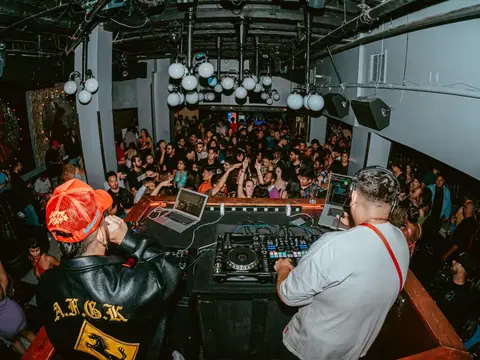Packed dance floor with hands in the air under the lights at The Catwalk Club, Downtown LA (Sat 25 June)