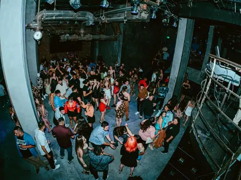 Packed dance floor with hands in the air under the lights at The Catwalk Club, Downtown LA (Sat 25 June)