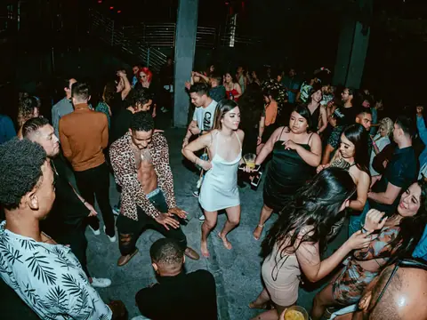 Packed dance floor with hands in the air under the lights at The Catwalk Club, Downtown LA (Sat 25 June)