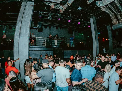 Packed dance floor with hands in the air under the lights at The Catwalk Club, Downtown LA (Sat 25 June)