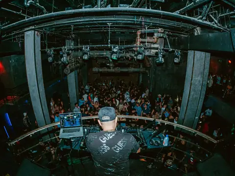 Packed dance floor with hands in the air under the lights at The Catwalk Club, Downtown LA (Sat 25 June)