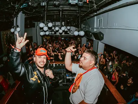 Packed dance floor with hands in the air under the lights at The Catwalk Club, Downtown LA (Sat 25 June)