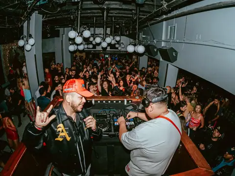 Packed dance floor with hands in the air under the lights at The Catwalk Club, Downtown LA (Sat 25 June)