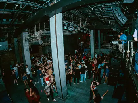 Packed dance floor with hands in the air under the lights at The Catwalk Club, Downtown LA (Sat 25 June)
