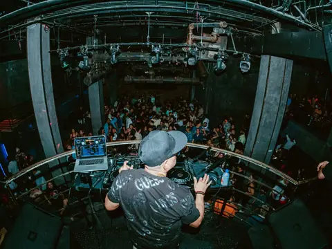 Packed dance floor with hands in the air under the lights at The Catwalk Club, Downtown LA (Sat 25 June)