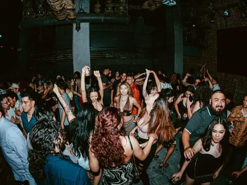 Packed dance floor with hands in the air under the lights at The Catwalk Club, Downtown LA (Sat 25 June)
