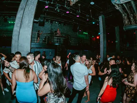 Packed dance floor with hands in the air under the lights at The Catwalk Club, Downtown LA (Sat 25 June)