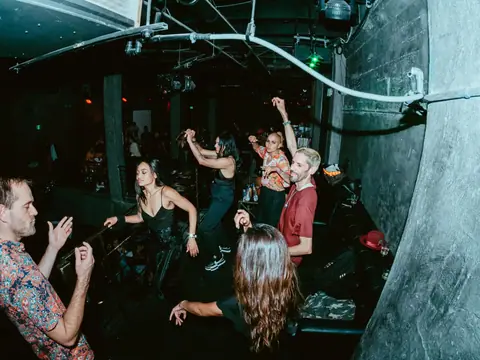 Packed dance floor with hands in the air under the lights at The Catwalk Club, Downtown LA (Sat 25 June)