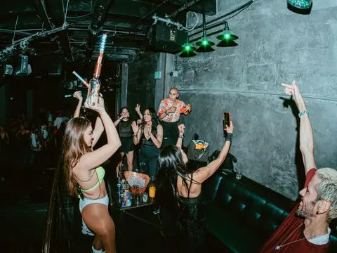 Packed dance floor with hands in the air under the lights at The Catwalk Club, Downtown LA (Sat 25 June)