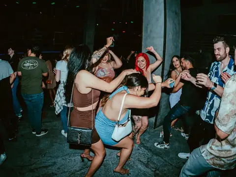 Packed dance floor with hands in the air under the lights at The Catwalk Club, Downtown LA (Sat 25 June)
