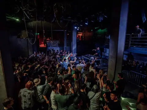 Packed dance floor with hands in the air under the lights at The Catwalk Club, Downtown LA (Sat 18 June)