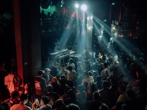 Packed dance floor with hands in the air under the lights at The Catwalk Club, Downtown LA (Sat 18 June)