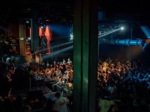 Packed dance floor with hands in the air under the lights at The Catwalk Club, Downtown LA (Sat 18 June)