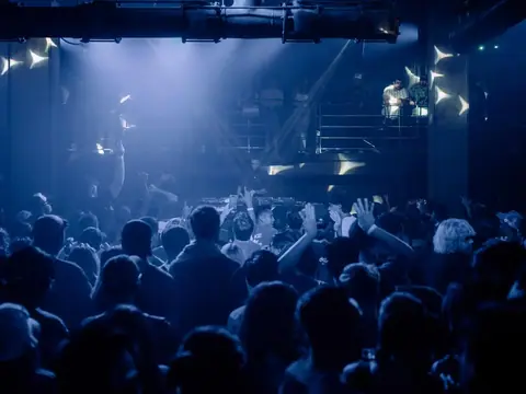 Packed dance floor with hands in the air under the lights at The Catwalk Club, Downtown LA (Sat 18 June)
