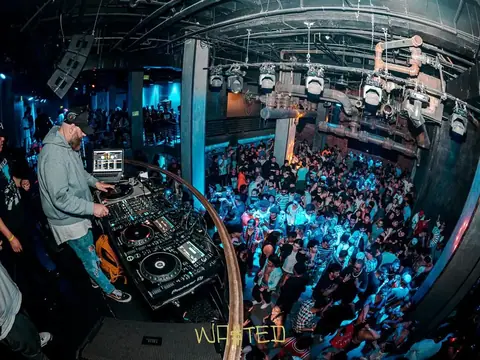 DJ performing in the booth above the crowd at The Catwalk Club, Downtown LA (Fri 17 June)
