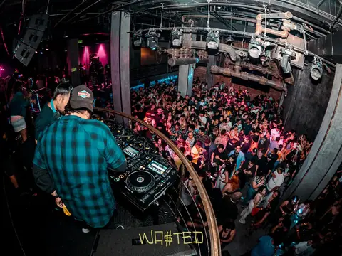 DJ performing in the booth above the crowd at The Catwalk Club, Downtown LA (Fri 17 June)