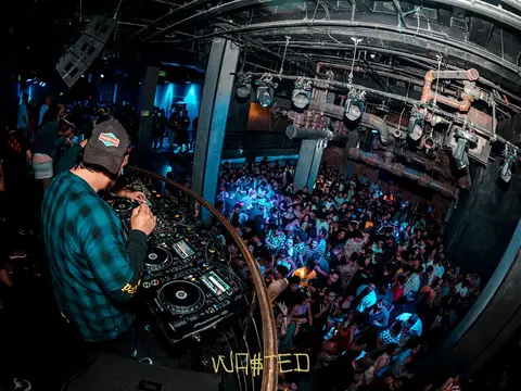 DJ performing in the booth above the crowd at The Catwalk Club, Downtown LA (Fri 17 June)