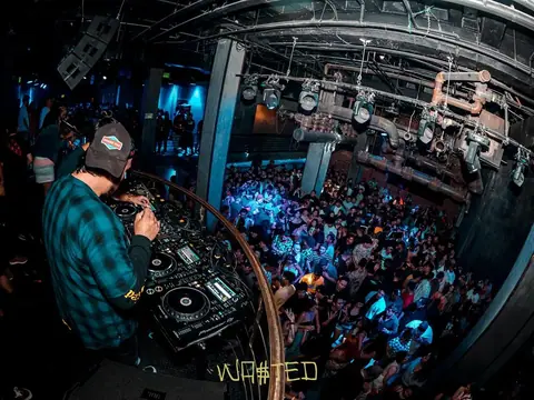 DJ performing in the booth above the crowd at The Catwalk Club, Downtown LA (Fri 17 June)