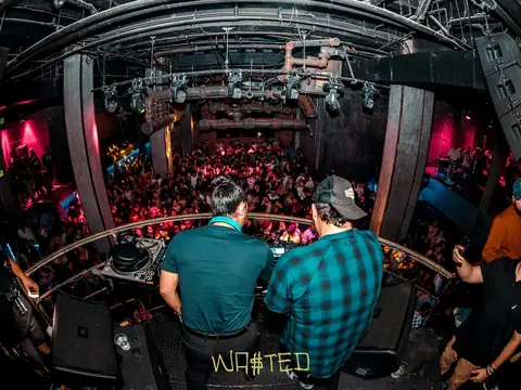 DJ performing in the booth above the crowd at The Catwalk Club, Downtown LA (Fri 17 June)