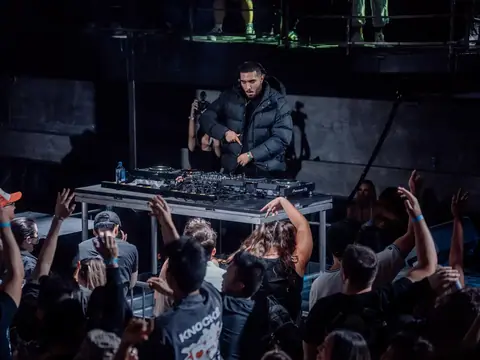 DJ performing in the booth above the crowd at The Catwalk Club, Downtown LA (Sat 18 June)