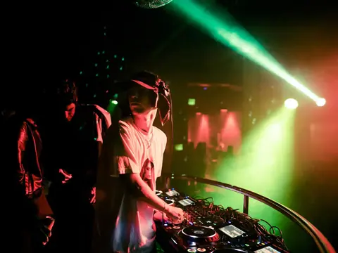DJ performing in the booth above the crowd at The Catwalk Club, Downtown LA (Fri 22 October)