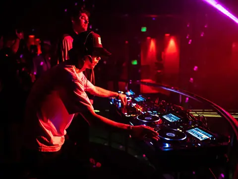 DJ performing in the booth above the crowd at The Catwalk Club, Downtown LA (Fri 22 October)