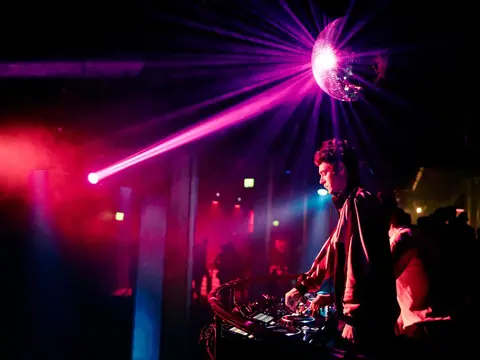 DJ performing in the booth above the crowd at The Catwalk Club, Downtown LA (Fri 22 October)