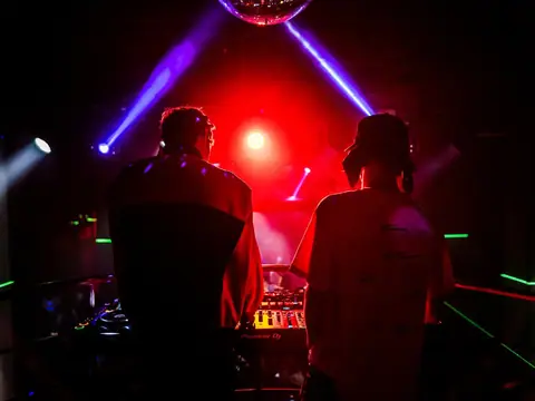 DJ performing in the booth above the crowd at The Catwalk Club, Downtown LA (Fri 22 October)